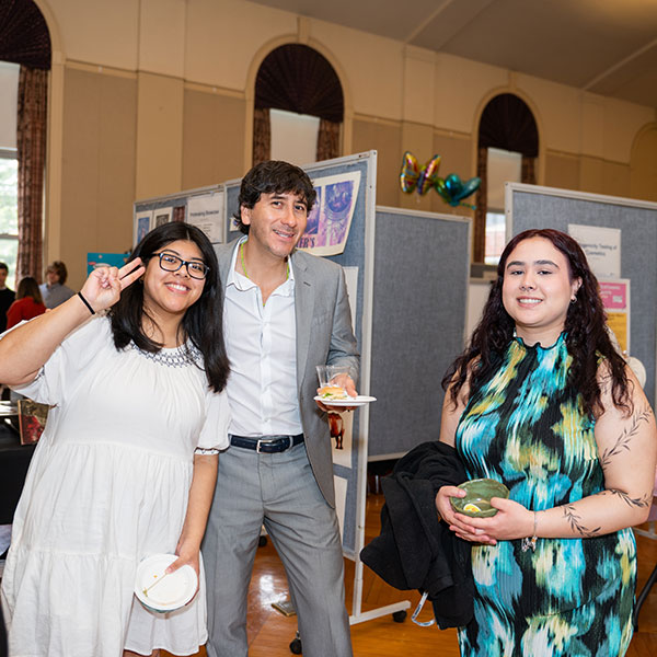 3 students at presentation